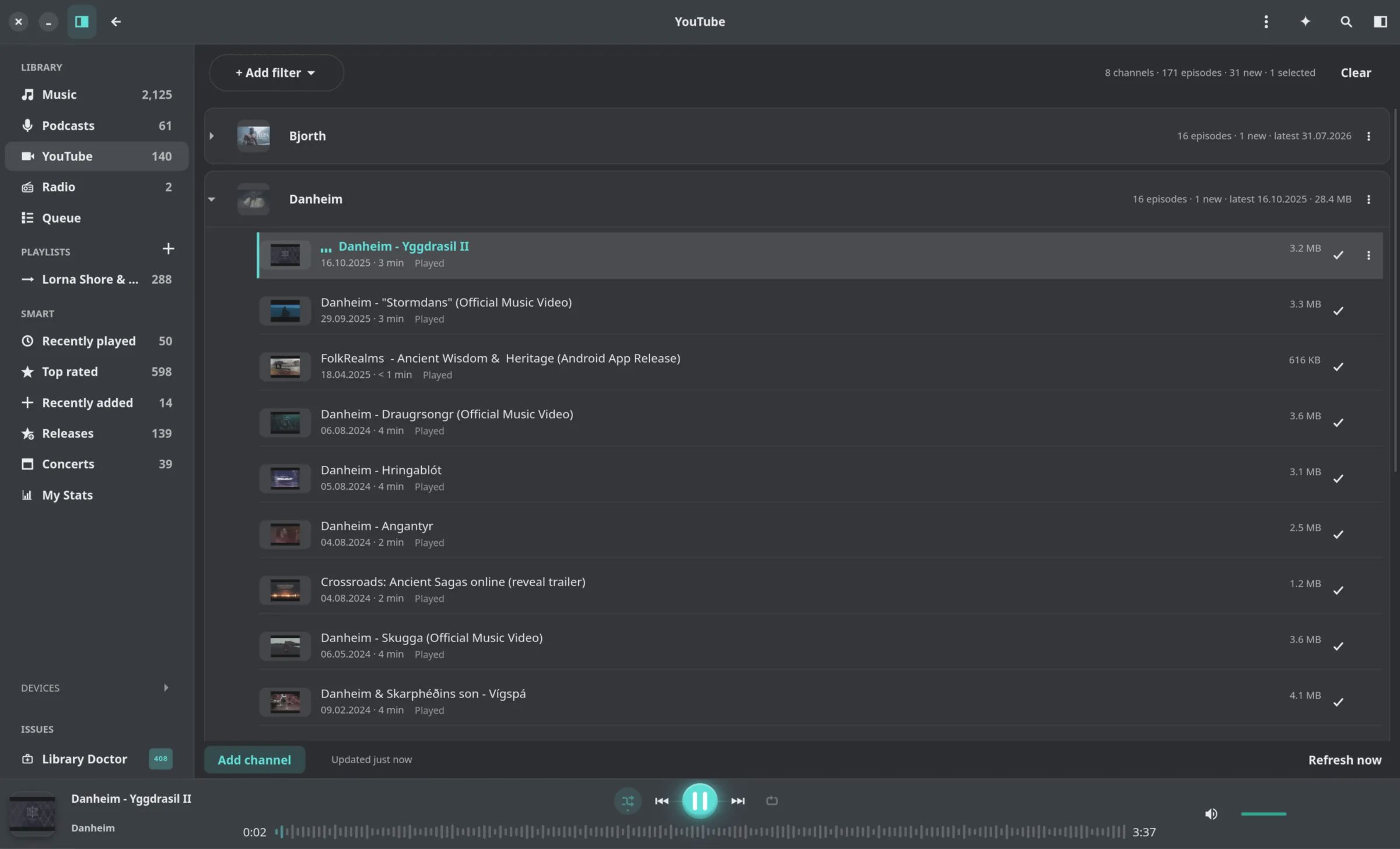 The Reprise YouTube view with channels and playable videos grouped in the library